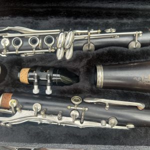 Boosey & Hawkes 2-20 clarinet, fully overhauled by Jennifer Pollmann, displayed in its case with keys, corks, and mouthpiece