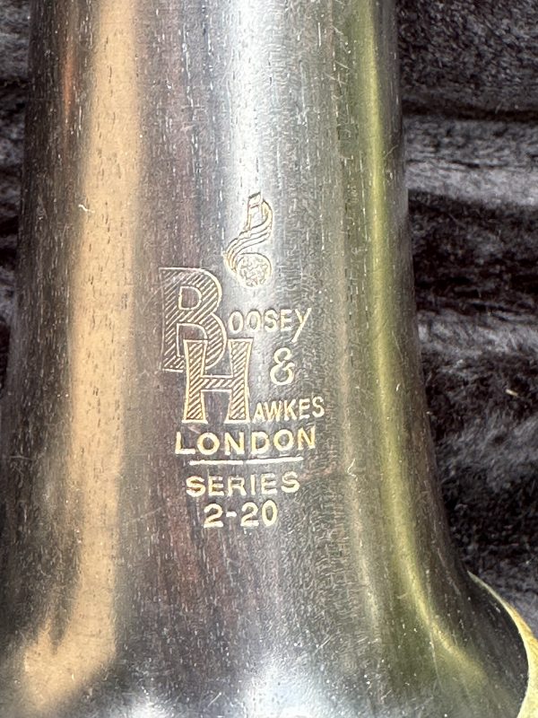 Close-up of Boosey & Hawkes London Series 2-20 clarinet bell engraving, showing fine craftsmanship