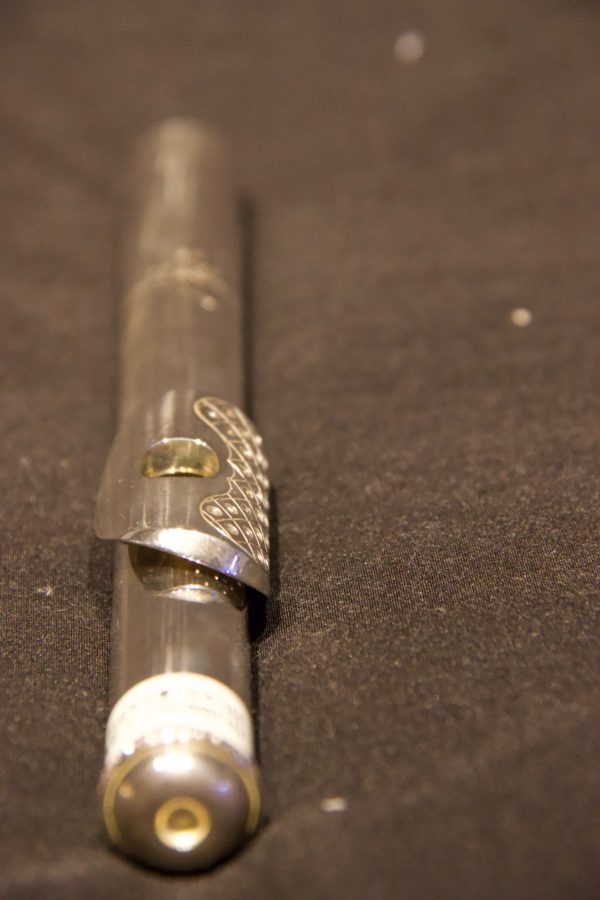 Angled perspective showing end cap and perforated lip plate design on Hubert Laws edition headjoint