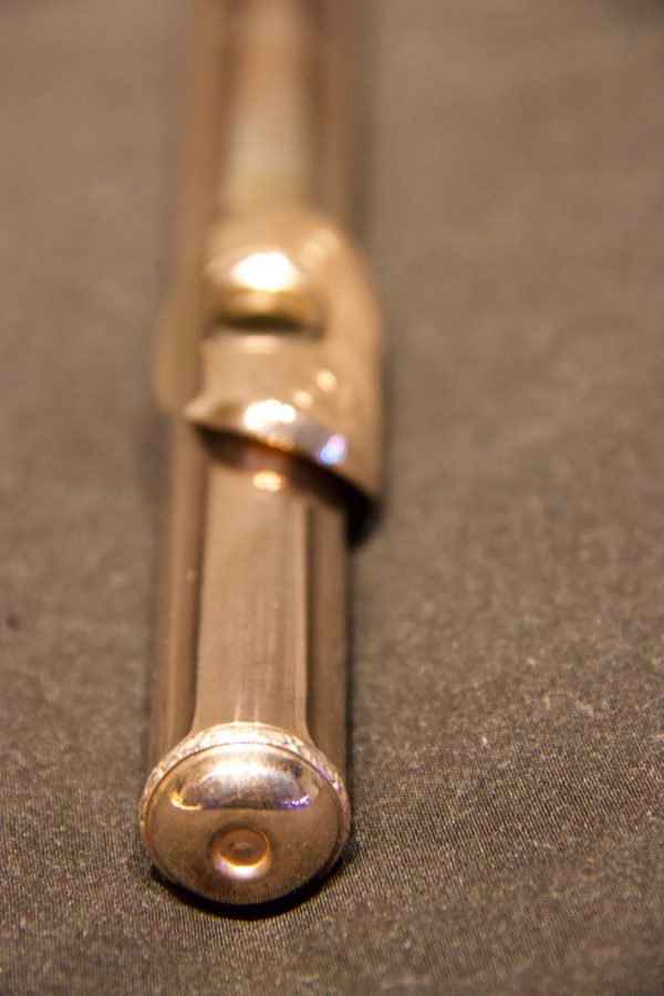Angled perspective of Jeff Weissman headjoint with engraved gold lip plate and silver body