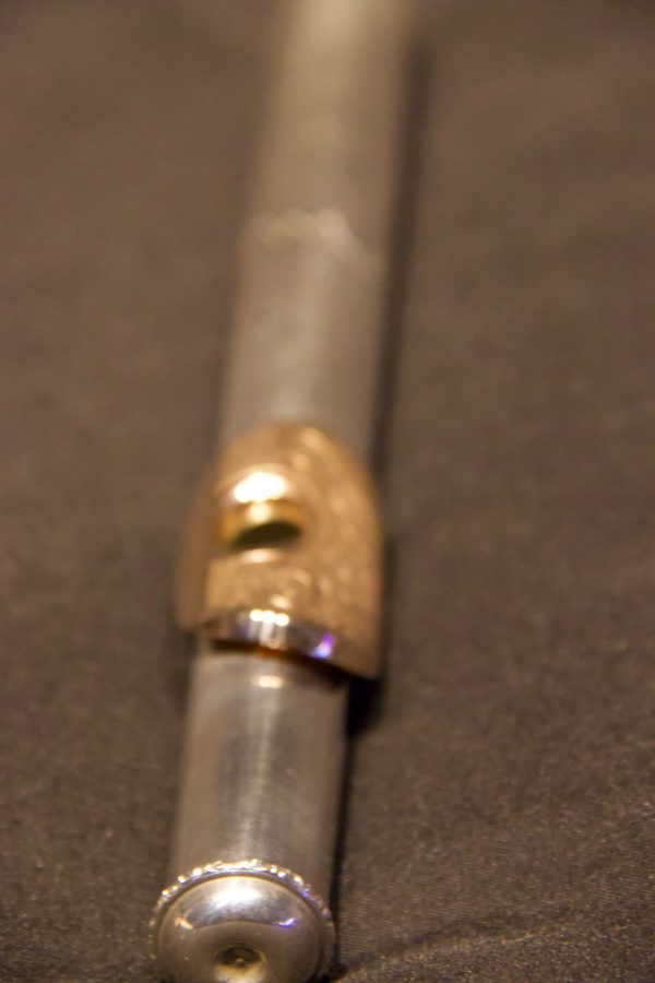 Close perspective of Weissman silver headjoint with engraved gold lip plate