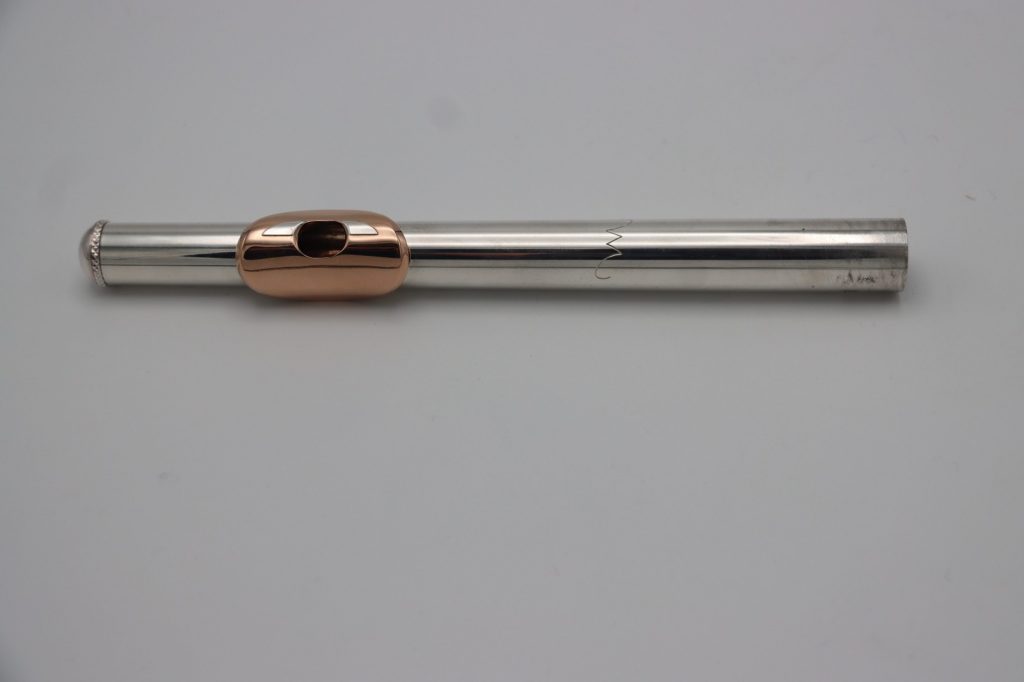 Weissman McKenna flute headjoint featuring gold-plated lip plate