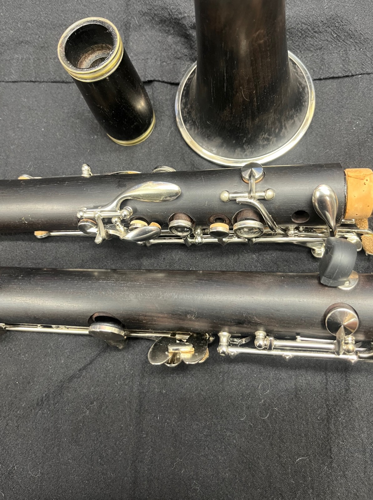 Close-up of Yamaha wood clarinet keywork, tone holes and body condition.